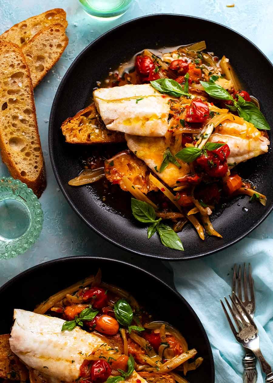 Overhead photo of 2 plates of Acqua Pazza - Italian Poached Fish