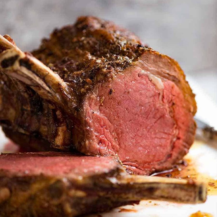 Beef Standing Rib Roast (Prime Rib) medium rare with slice cut, showing the inside