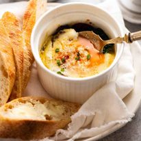 Freshly made Baked Eggs (shirred eggs) being eaten