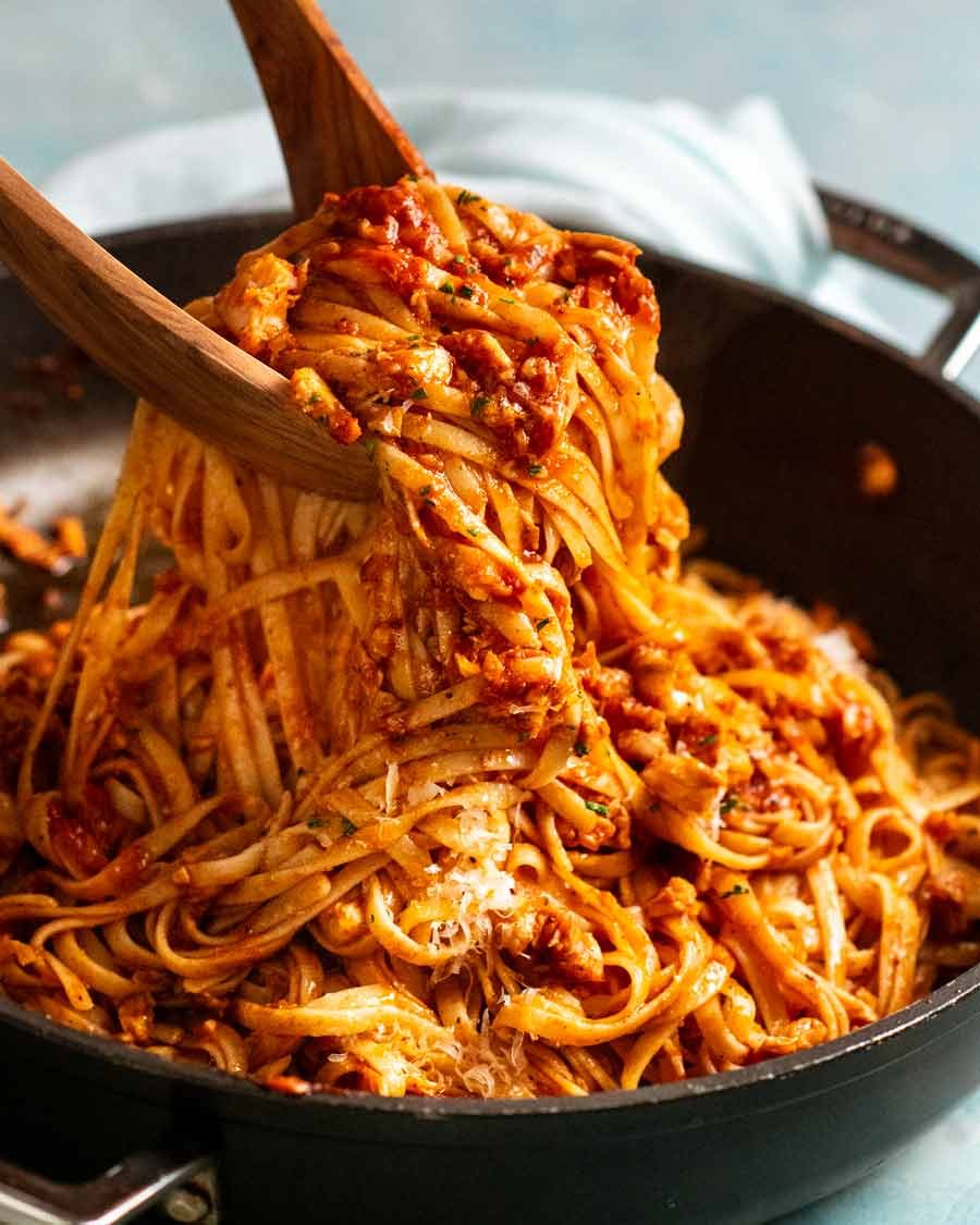 Tossing Calabrian fish ragu pasta