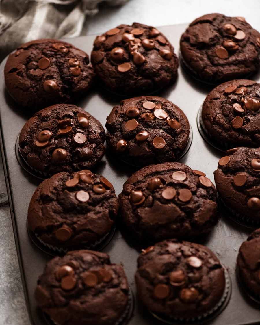 Muffin tin of freshly baked Chocolate Muffins