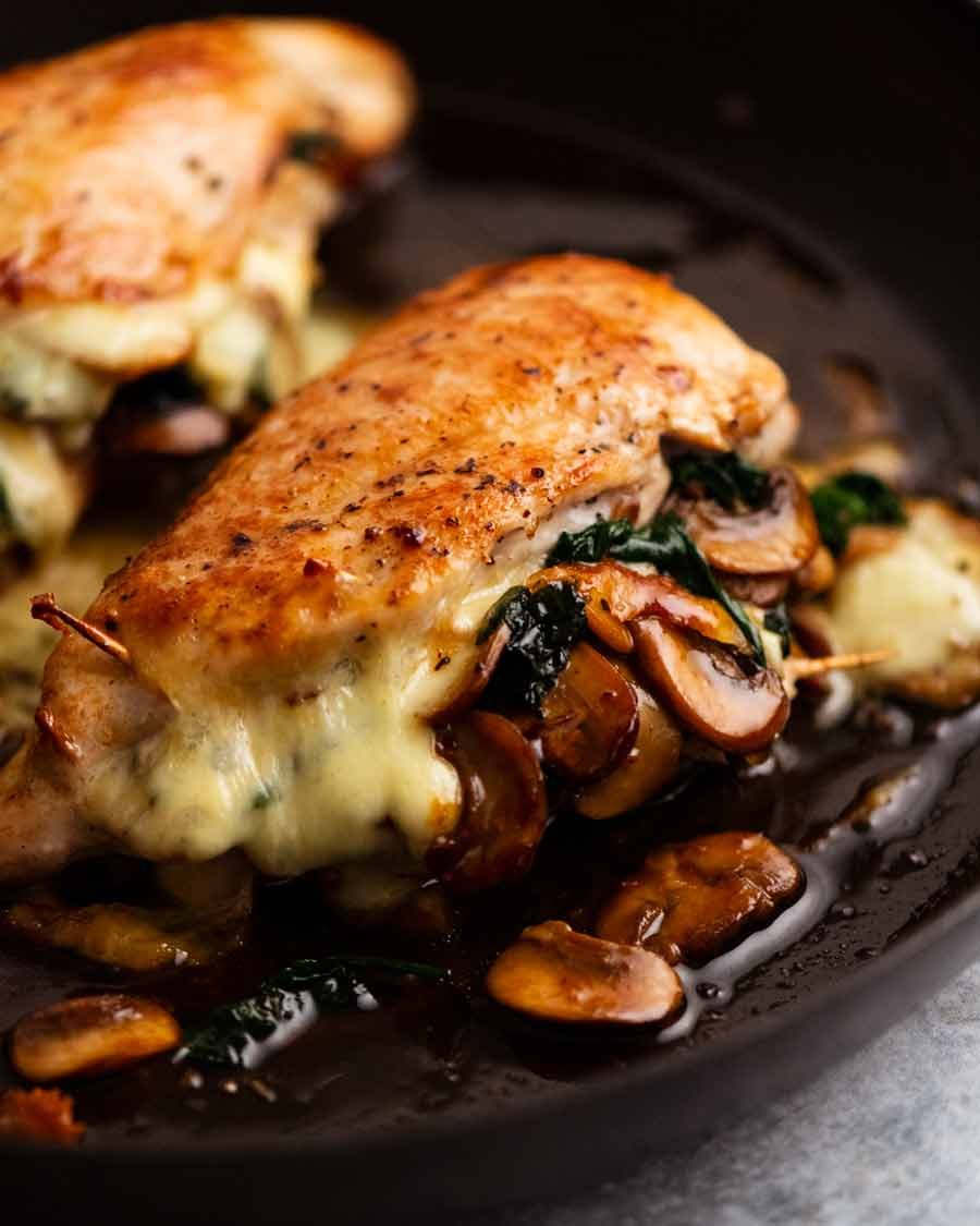 Mushroom Stuffed Chicken Breast in a skillet, fresh out of the oven