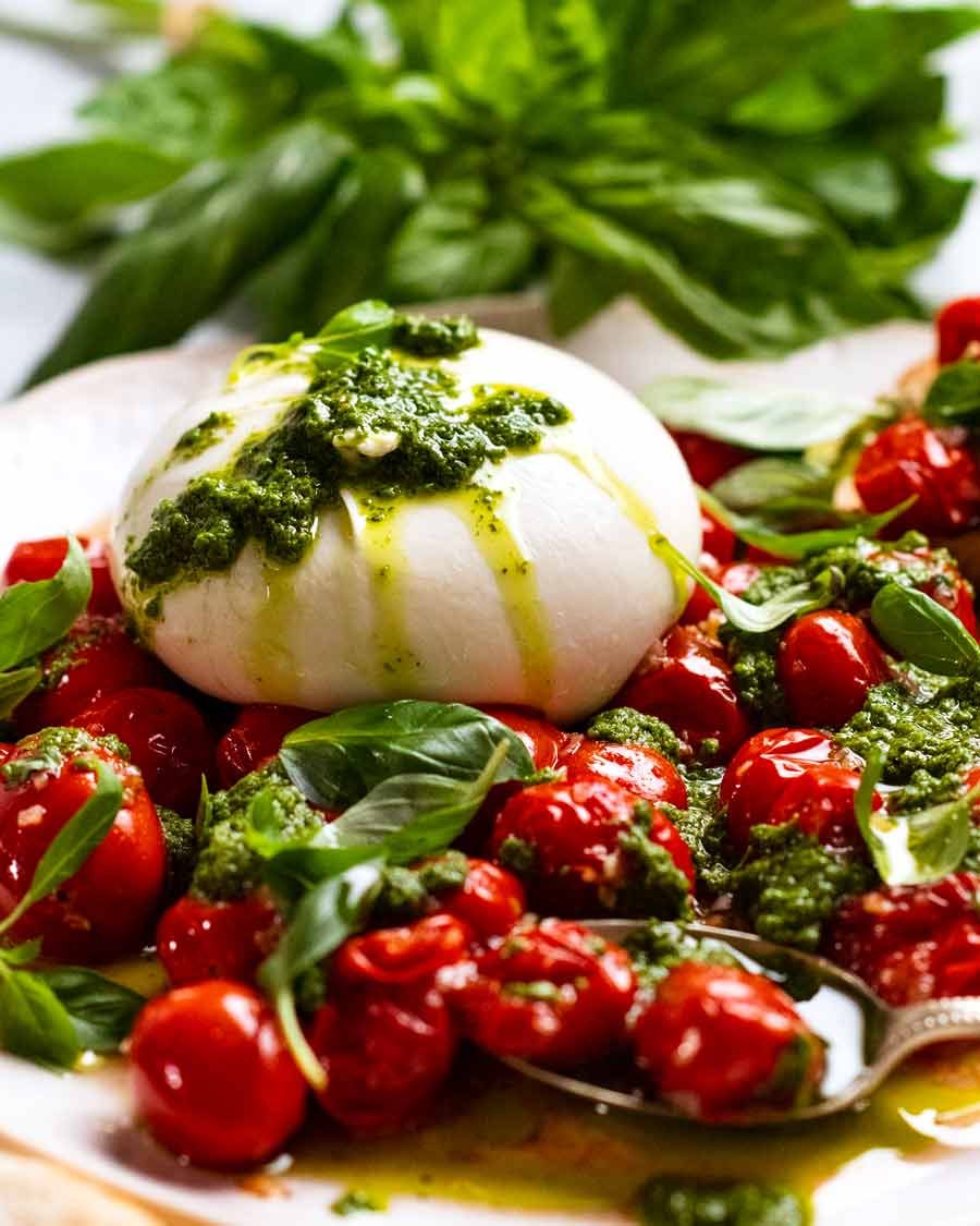 Burst tomato burrata salad ready to serve