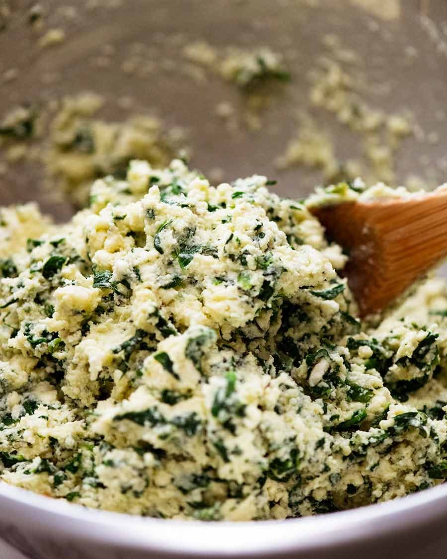 Bowl of spinach ricotta mixture to make Malfatti - Italian Spinach Ricotta Dumplings