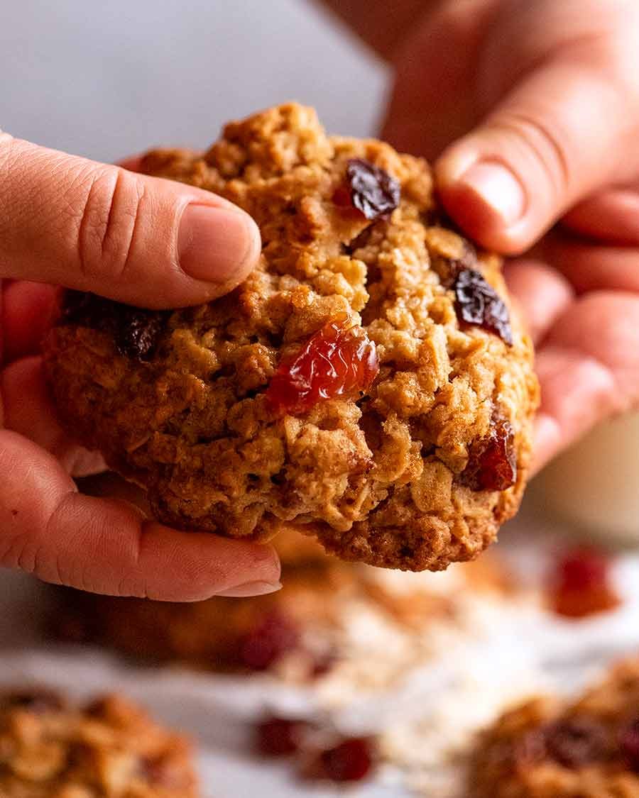 Hand breaking Oatmeal Raisin Cookies