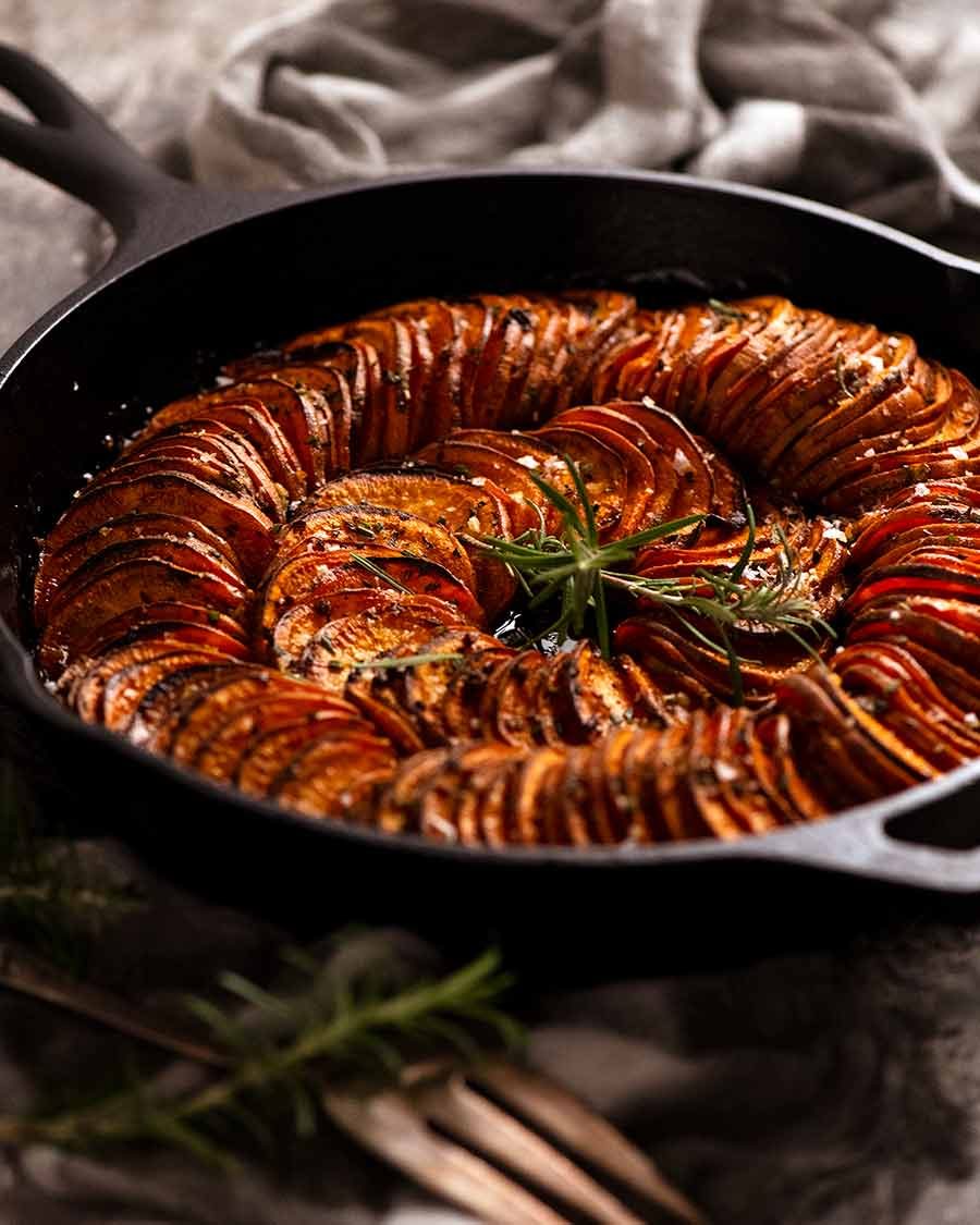 Sweet Potato Bake( side dish) in a black skillet, fresh out of the oven