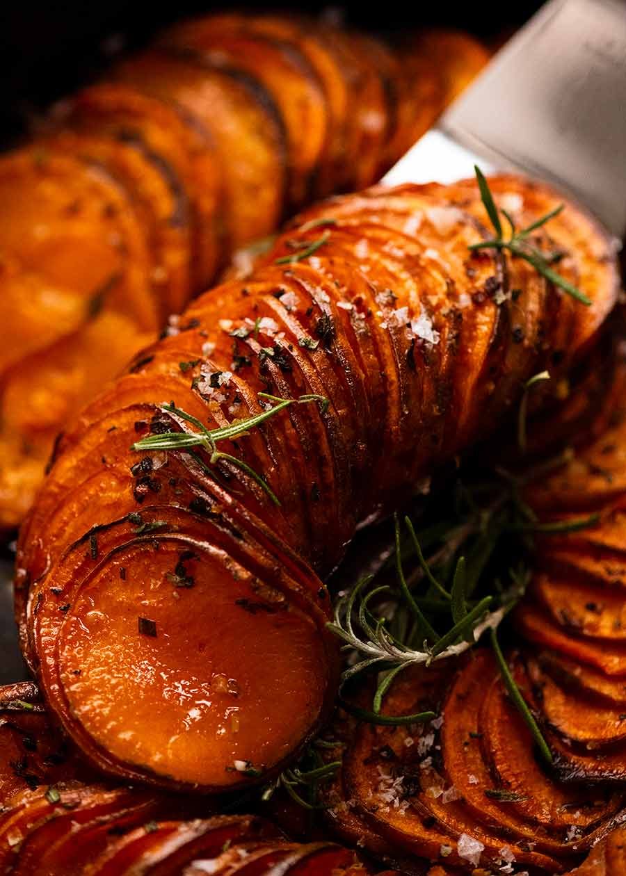 Scooping up Sweet Potato Bake( side dish)