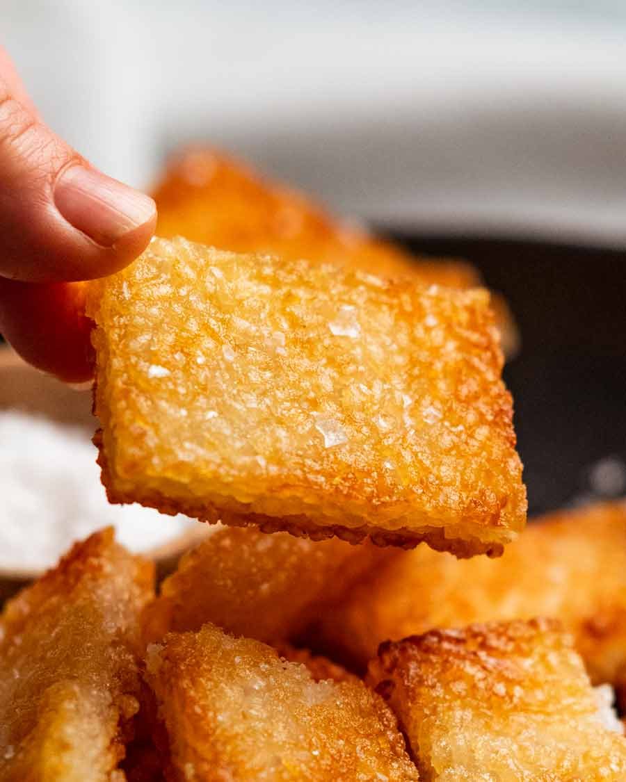 Hand holding crispy rice