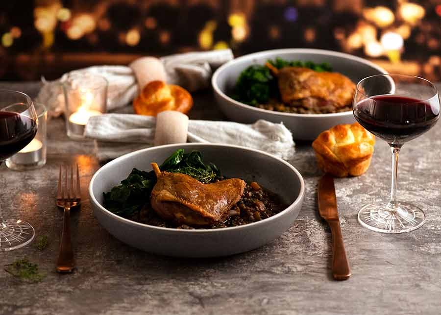 Duck Confit dinner served with French lentils