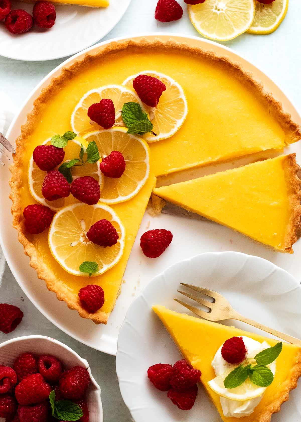 French Lemon Tart - Tarte au citron - being sliced to serve