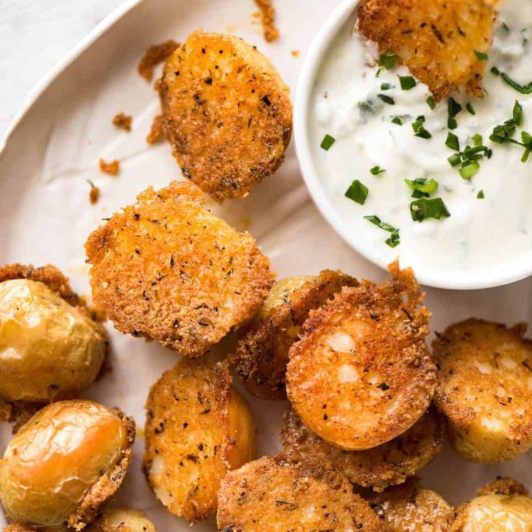 Make these Crispy Roasted Parmesan Potatoes for your Sunday roast or pass them around at a party! recipetineats.com