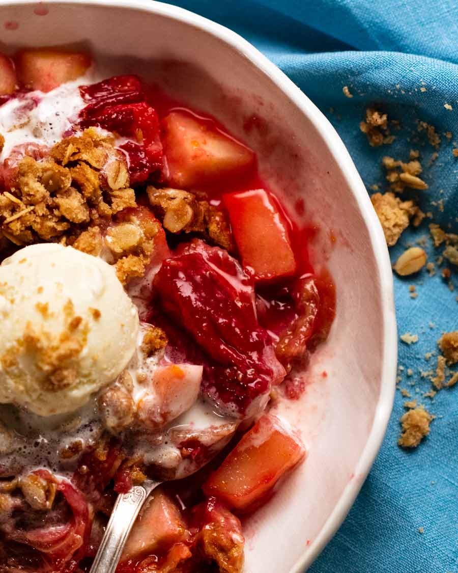 Close up of Rhubarb crumble with apple in a bowl