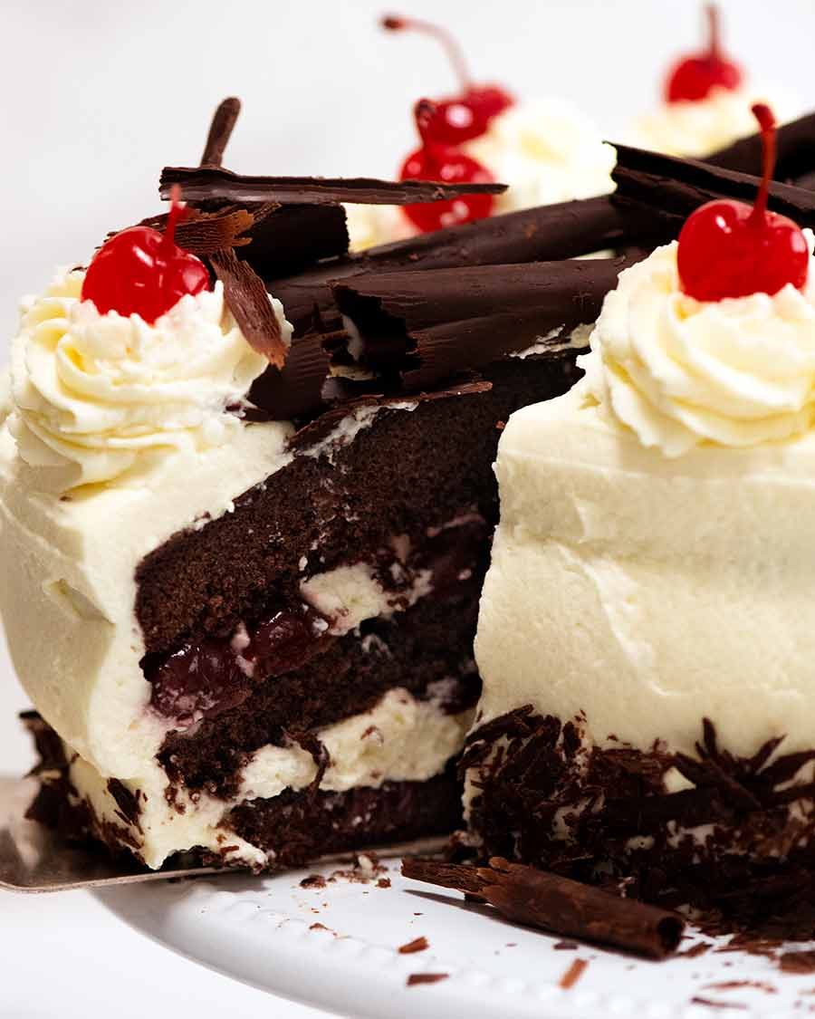 Close up of a slice of Black Forest Cake being pulled out