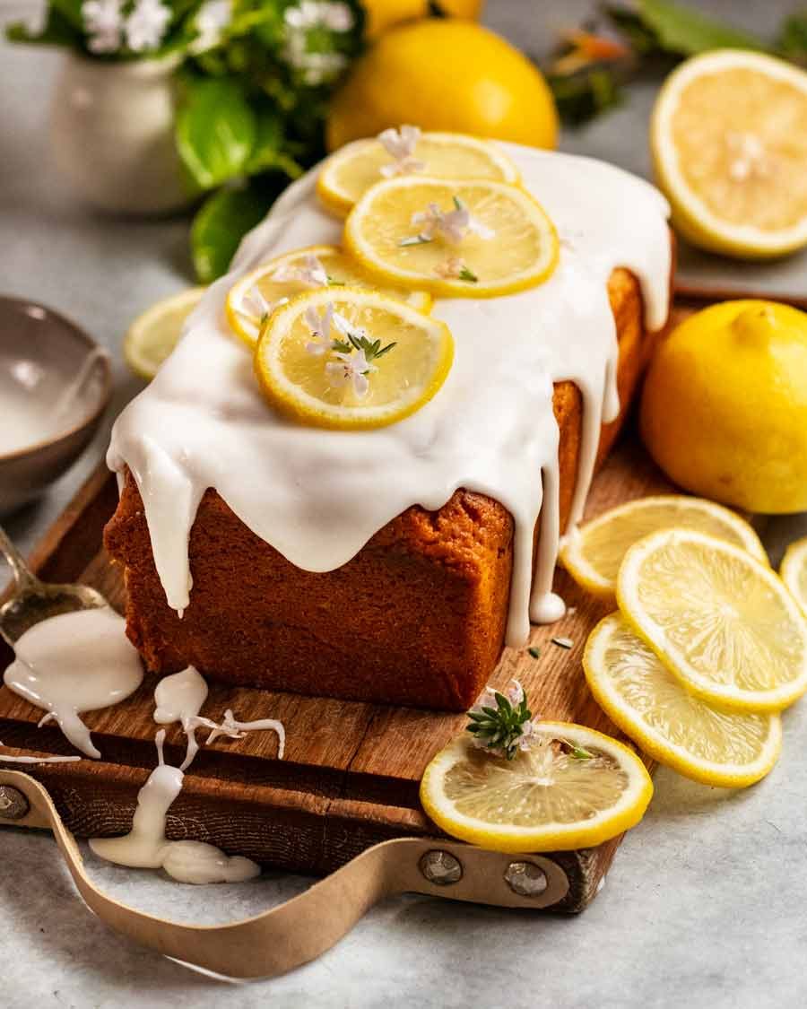 Glazed lemon loaf on cutting board