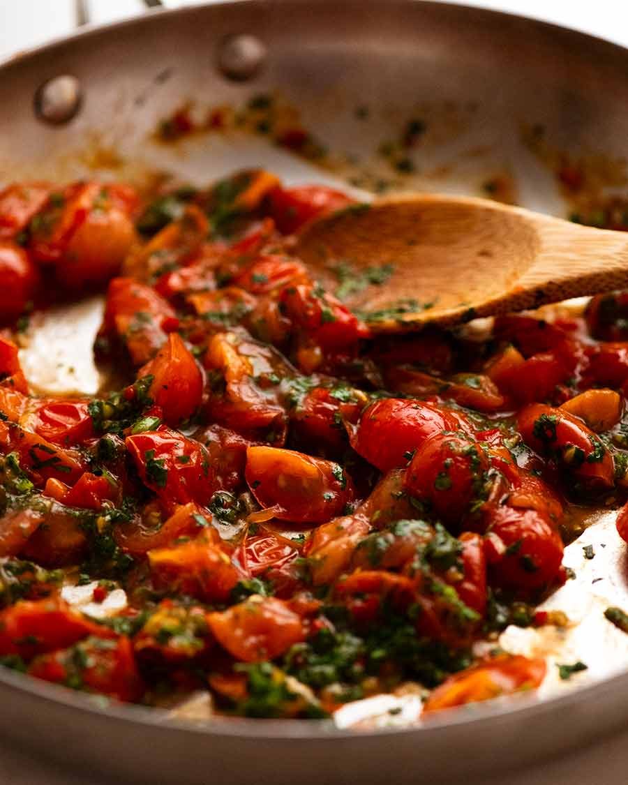 Close up of tomato salsa topping for Golden Turmeric Fish (Indonesian) with a quick Sambal Tomat made with cherry tomatoes