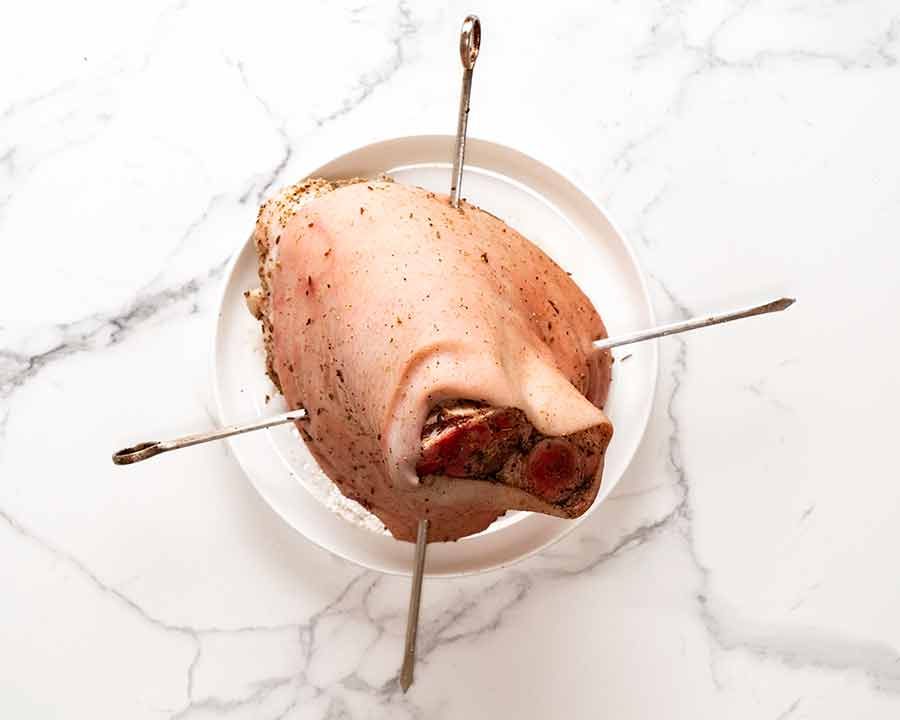 Overhead photo of prepared pork knuckle, ready to be roasted