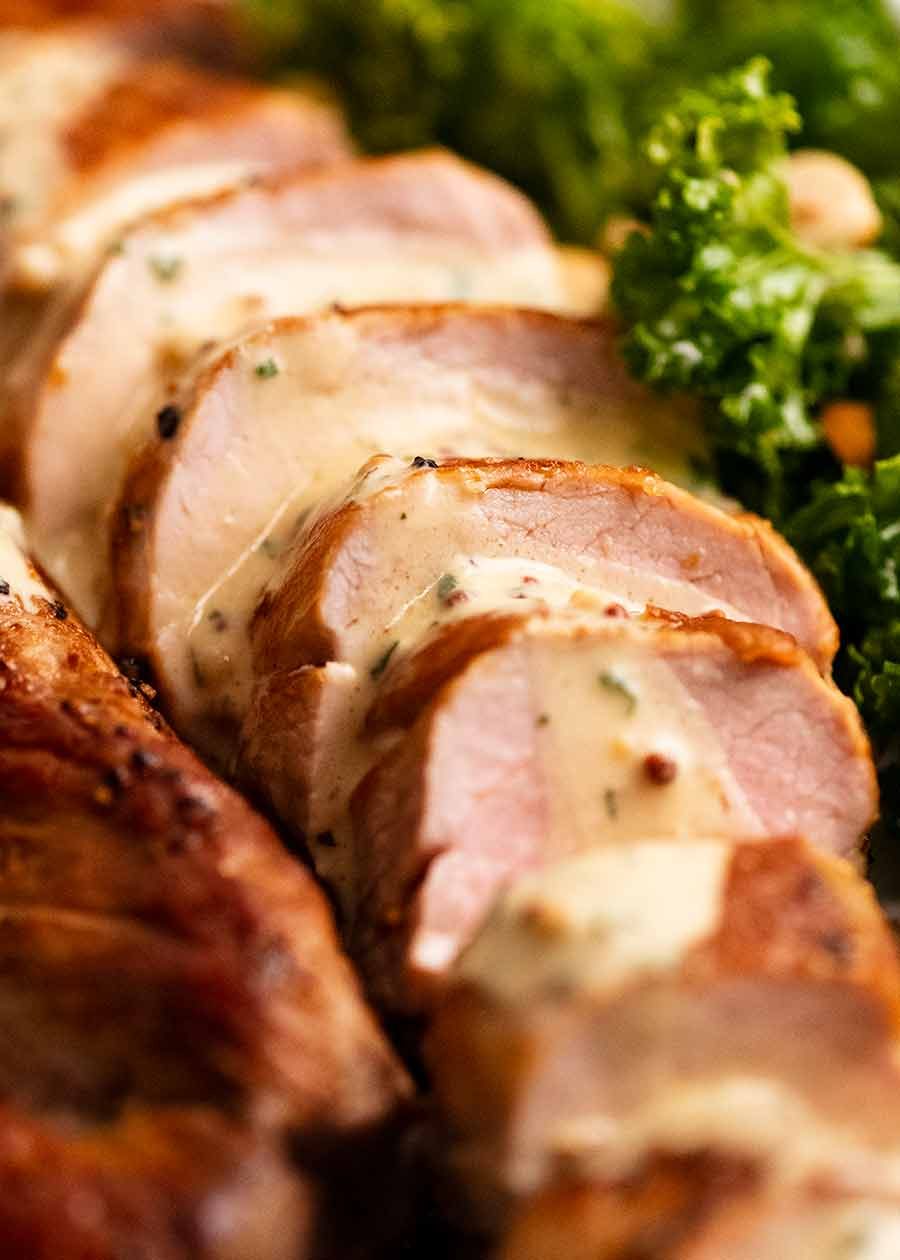 Close up of slices of Pork Tenderloin with Creamy Mustard Sauce