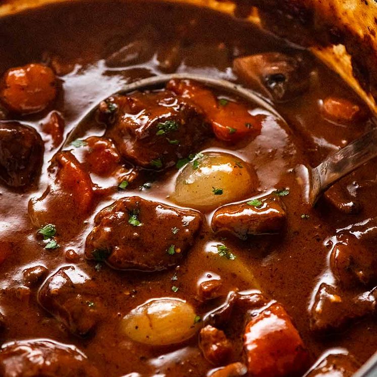 Beef Bourguignon in a pot, ready to be served