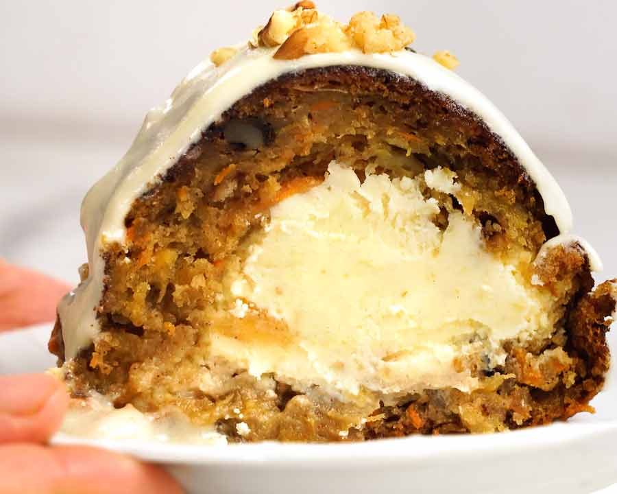 Close up of slice of Cheesecake stuffed carrot bundt cake