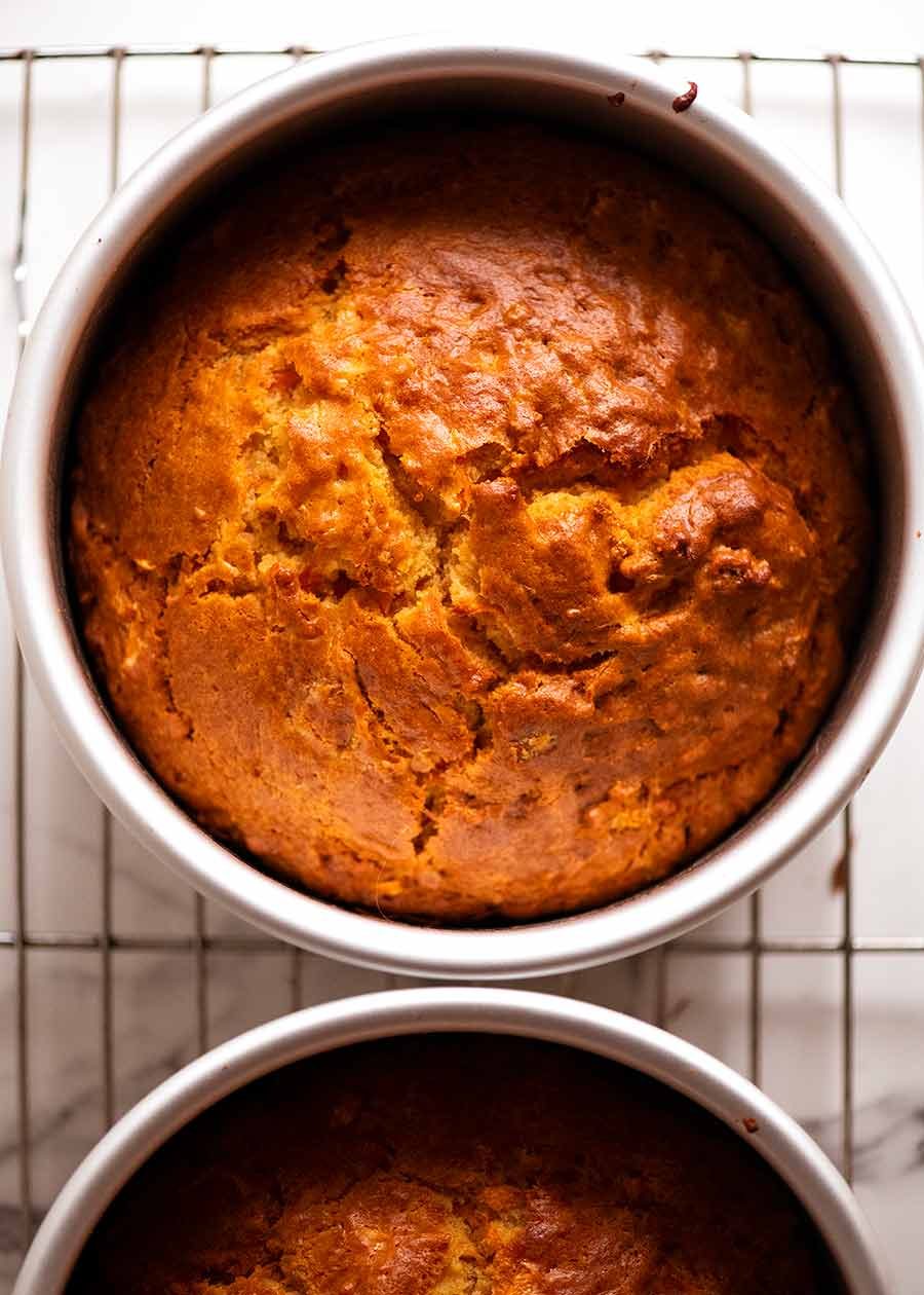 Dog friendly cakes in cake pans, fresh out of the oven