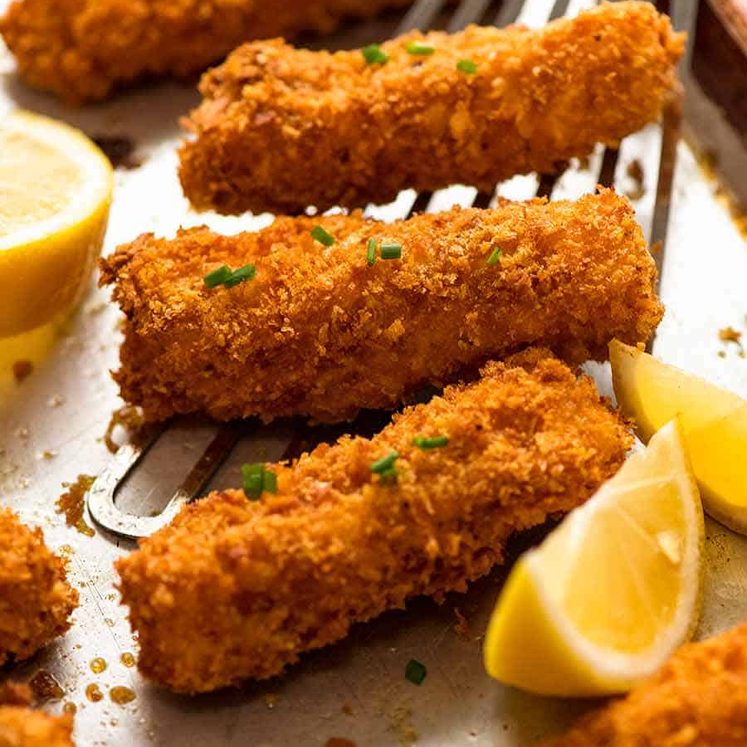 Oven baked Fish fingers on a tray, fresh out of the oven