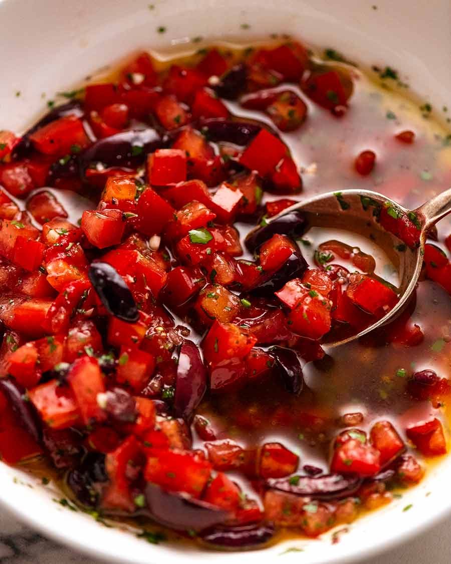 Sauce Vierge in a bowl, ready to be mixed