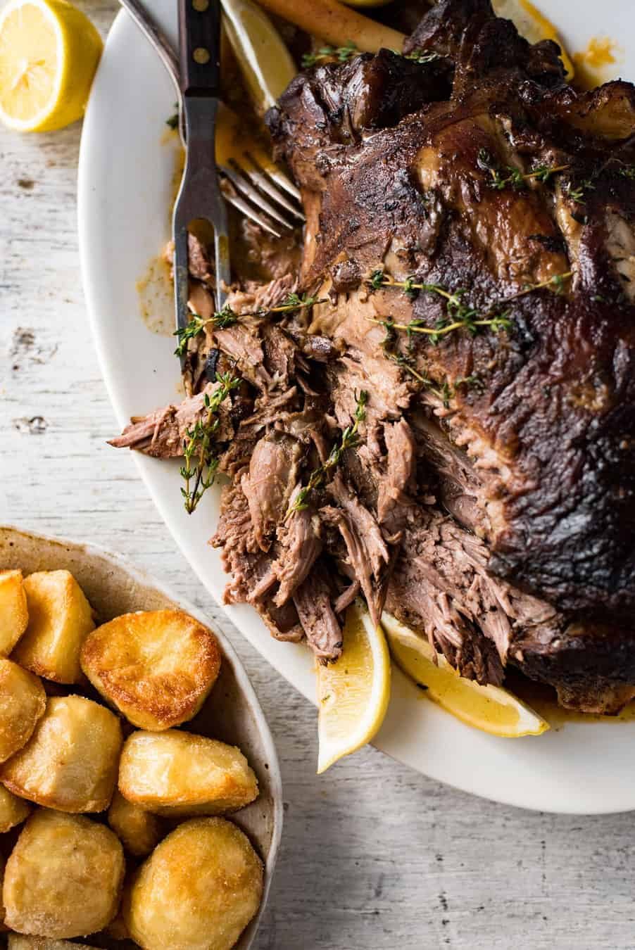 Slow Roasted GREEK Leg of Lamb - Tender fall apart lamb made the Greek way! Super easy.