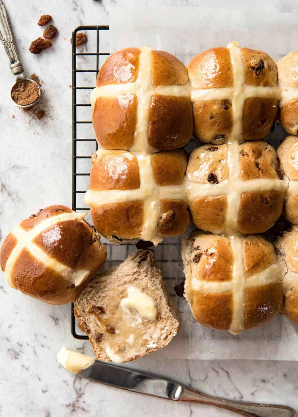 Easy Hot Cross Buns Recipe - perfectly spiced, fluffy and moist, with a no knead, no stand mixer option! www.reciptineats.com