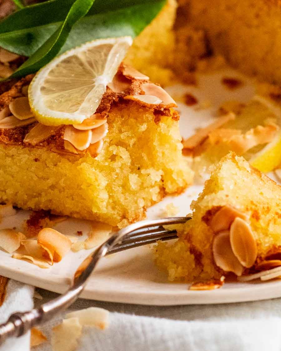 Close up photo of eating Lemon coconut almond cake