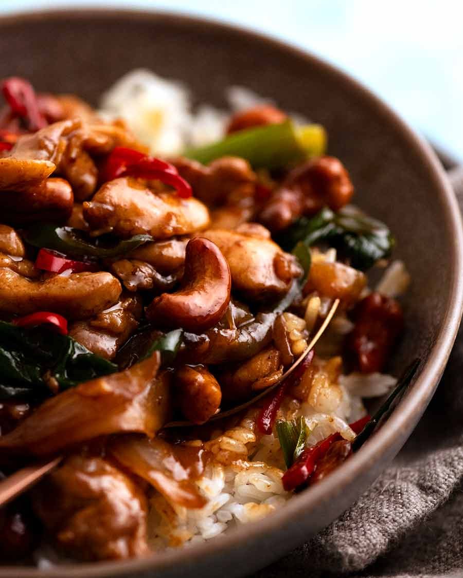 Close up photo of Thai Cashew Chicken Stir Fry served over jasmine rice