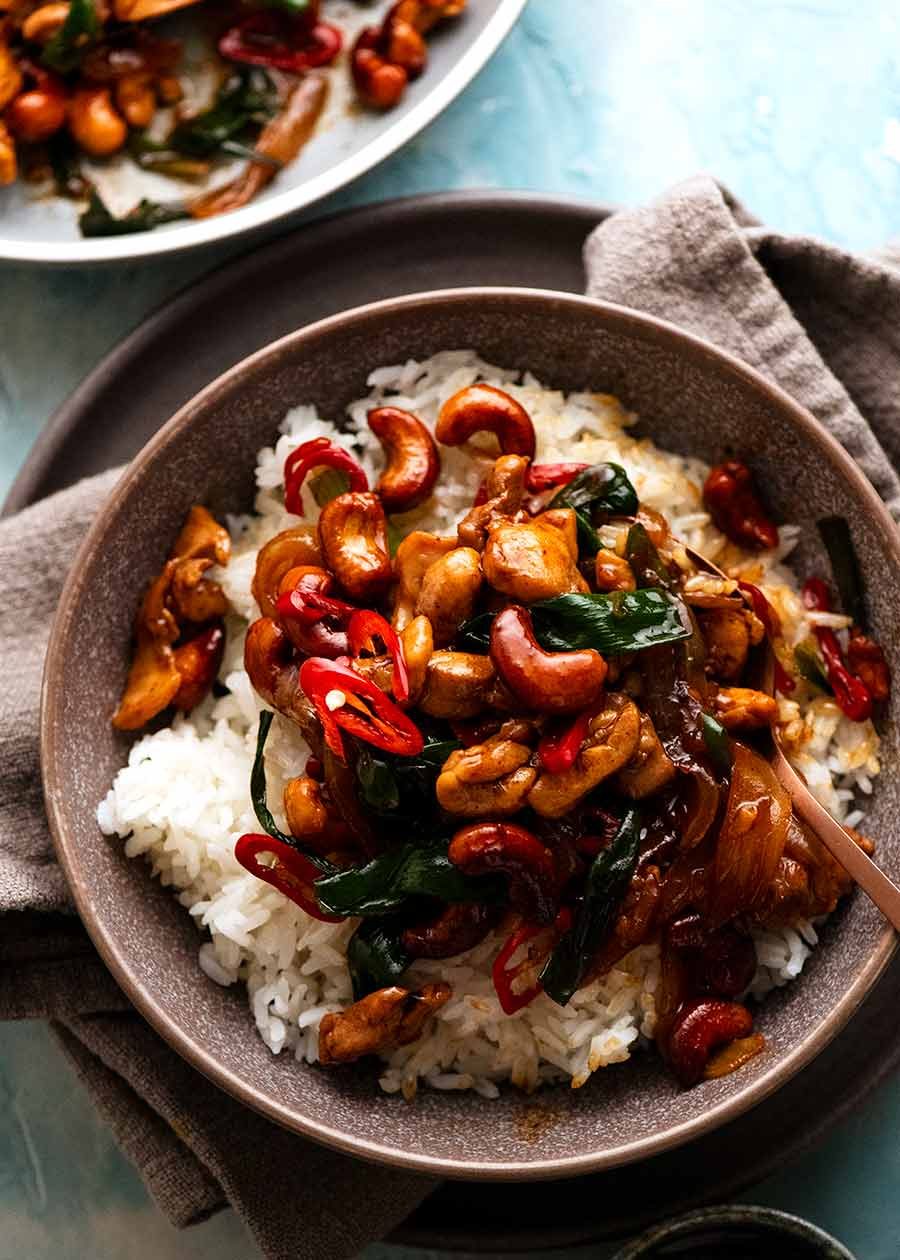 Thai Cashew Chicken Stir Fry on jasmine rice in a bowl, ready to be eaten