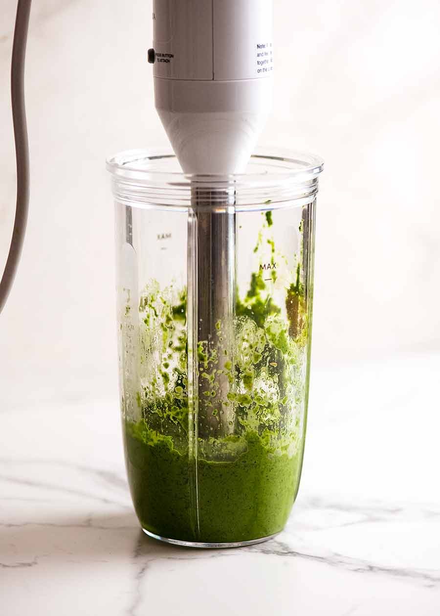 Salsa Verde being made with a stick blender