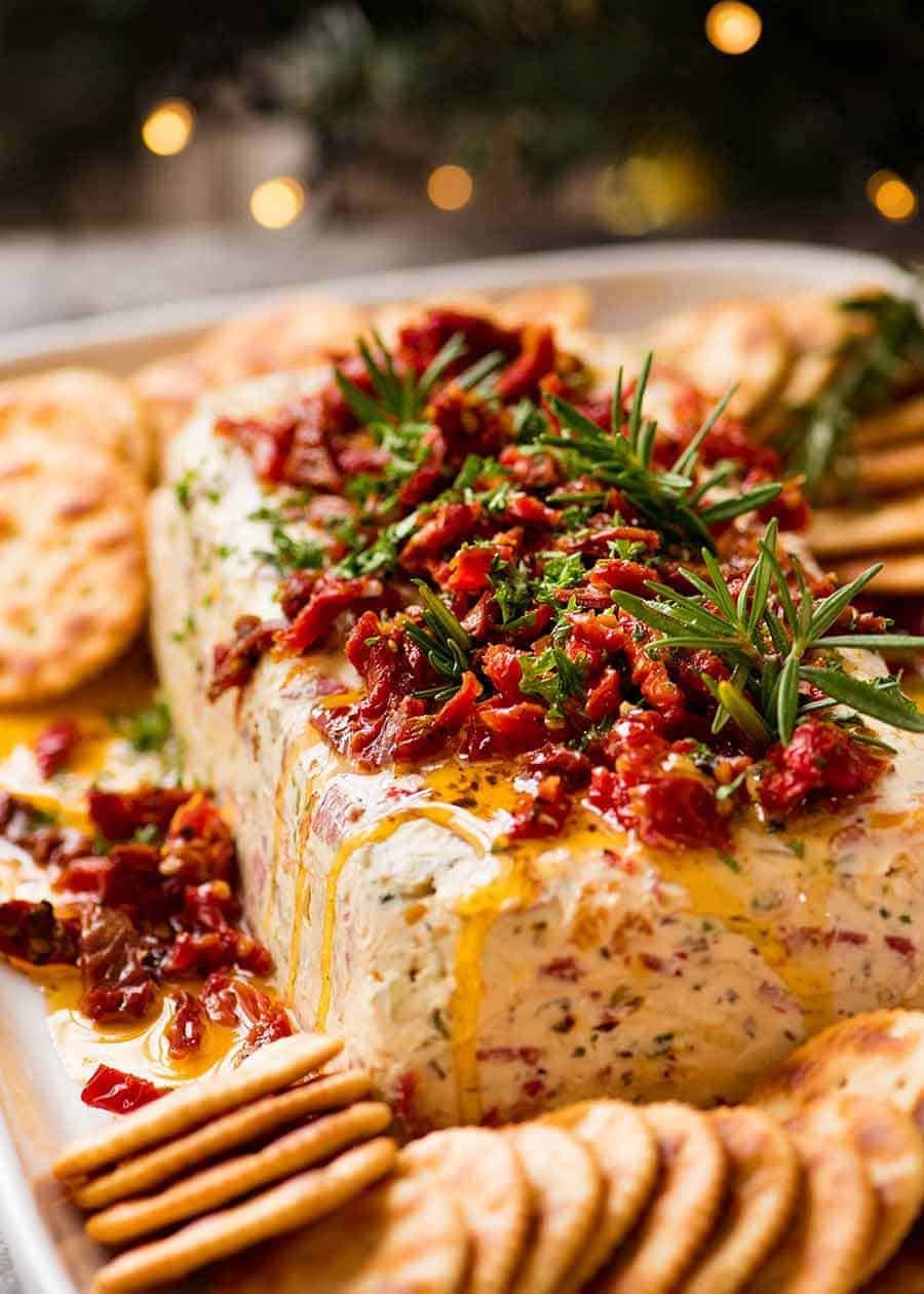 italian-cheese-log-christmas-appetizer_6a Christmas Appetiser Italian Cheese Log with Christmas tree in background - festive appetizer for the holidays