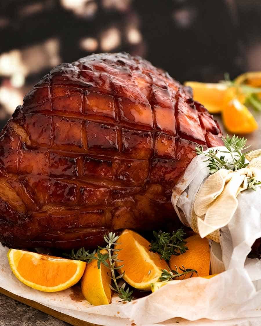 maple-glazed-ham_3 Maple Ham Glaze - glazed ham om a platter, ready to be carved. The most incredible baked ham ever!