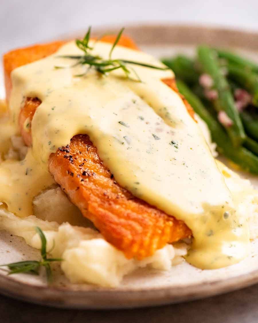 salmon-with-bearnaise-sauce-2 Salmon on a plate smothered in Bearnaise Sauce