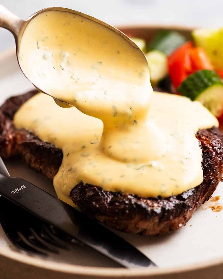 spooning-bearnaise-sauce-on-steak_5 Spooning Bearnaise Sauce over steak
