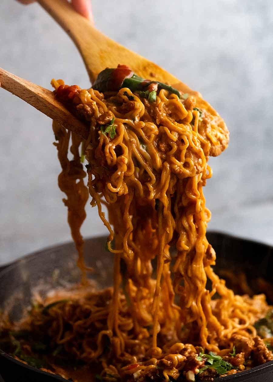 12-minute-thai-chicken-noodles Wooden spoons serving 12 Minute Thai Chicken Peanut Noodles