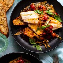 acqua-pazza_0-sq Acqua Pazza - Italian Poached Fish in a black skillet, ready to be served