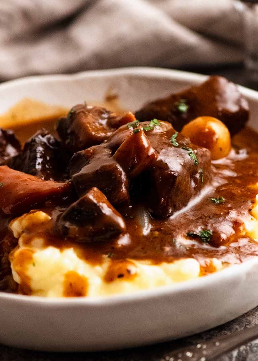beef-bourguignon_8 Beef Bourguignon in a bowl served over creamy mashed potato