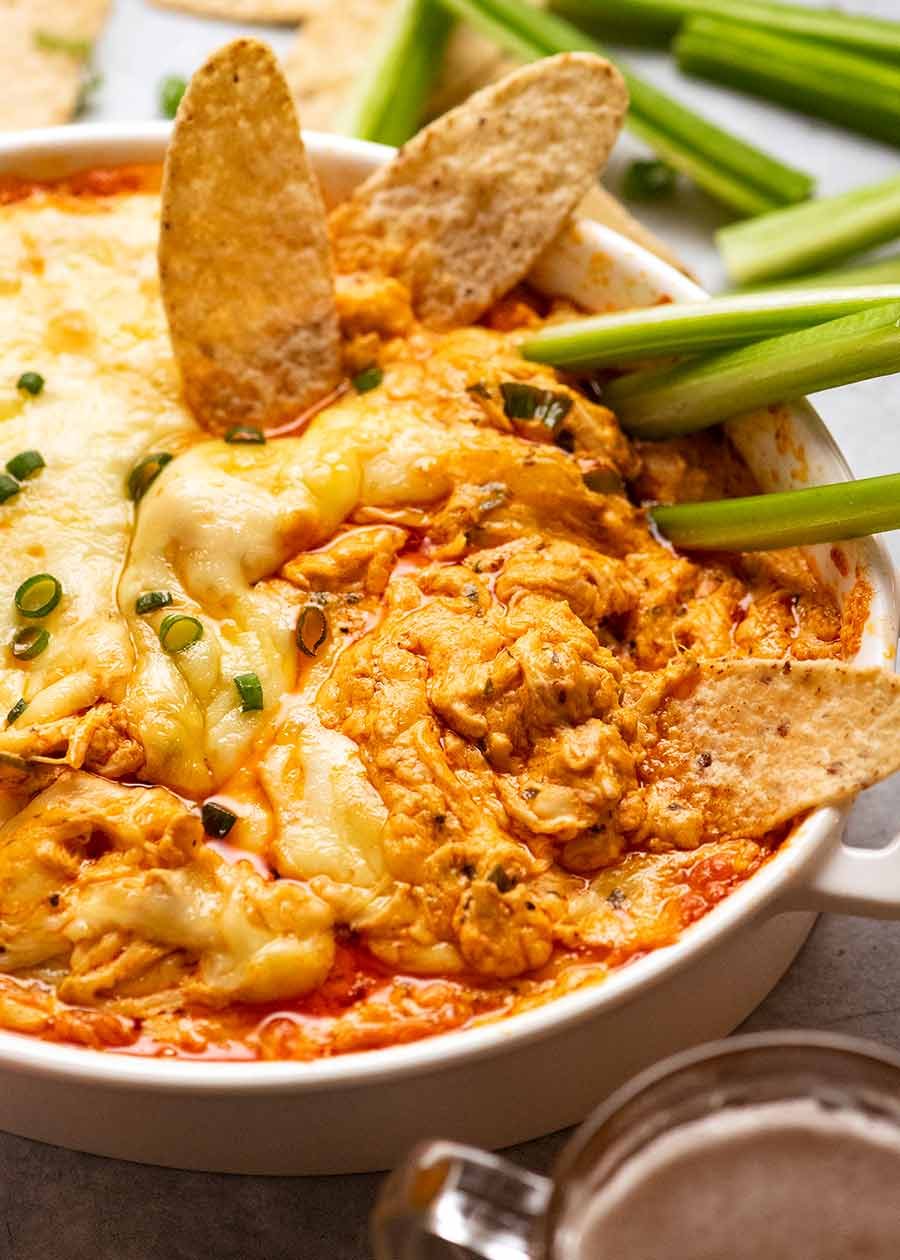 buffalo-chicken-dip_5 Close up of Hot Buffalo Chicken Dip being devoured at a party