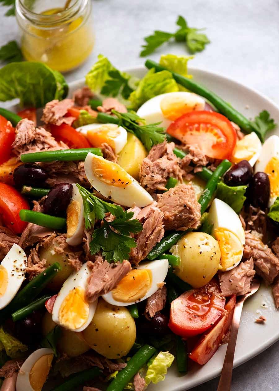 salade-nicoise-v2_7 Big plate of Salad Nicoise - French Tuna Salad, ready to be eaten