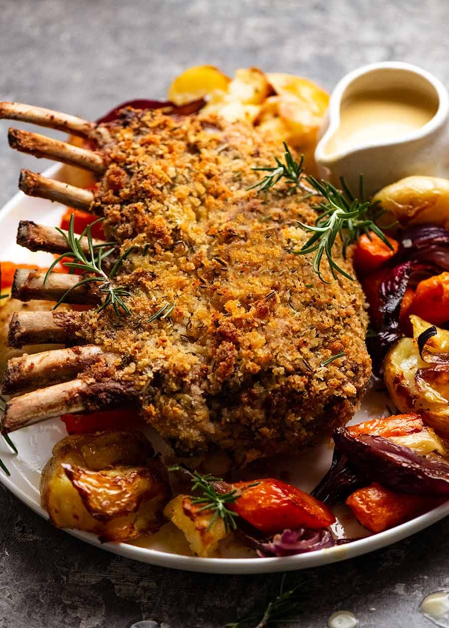 crumbed-rack-of-lamb_5 Rosemary Crumbed Rack of Lamb on a plate with roasted vegetables