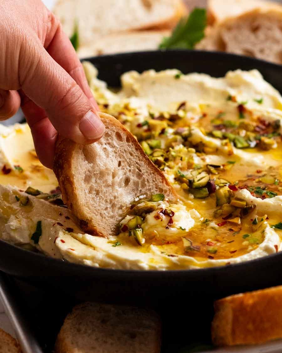 feta-dip_0 Dipping bread into Creamy Feta Dip