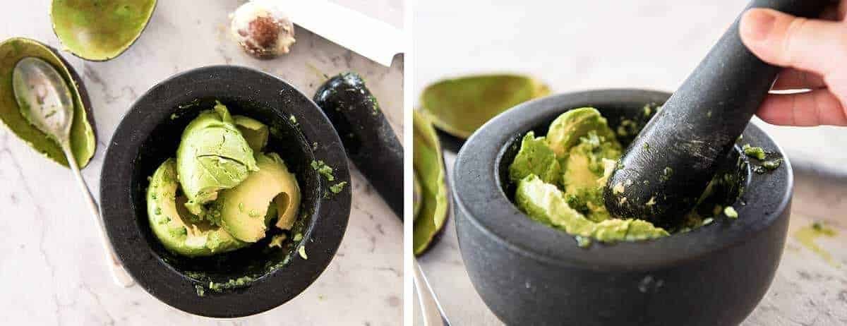 guacamole_diy2 Avocado in a mortar and pestle being mashed for guacamole.