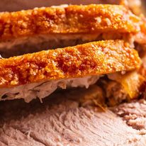 pork-roast-crispy-crackling_0-sq Close up of slices of Pork Roast with Crispy Crackling