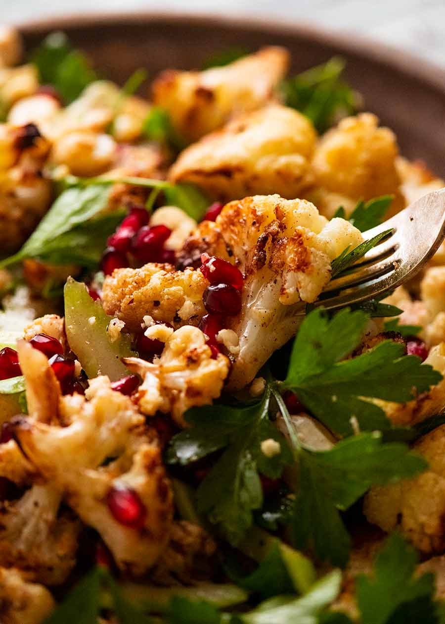 yotam-ottolenghis-cauliflower-salad_3 Close up of fork picking up Cauliflower Salad