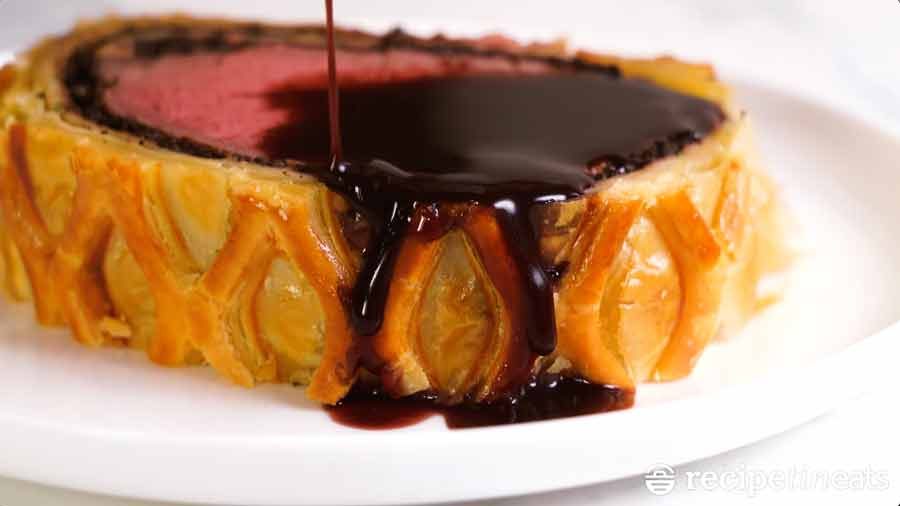 beef-wellington-slice-with-red-wine-sauce Beef Wellington recipe from RecipeTin Eats "Dinner" cookbook by Nagi Maehashi