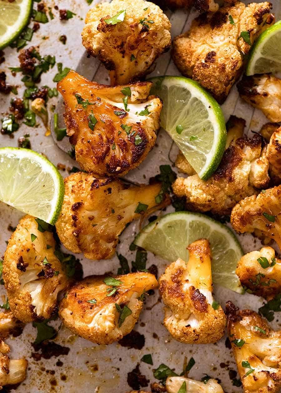 chipotle-lime-roasted-cauliflower_0 Close up of Chipotle Lime Roasted Cauliflower on a sheet pan, fresh out of the oven