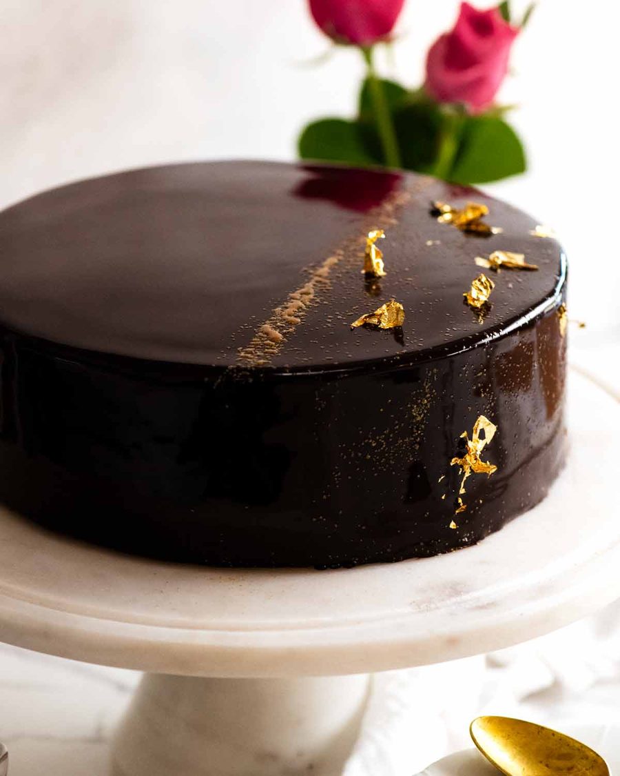 chocolate-mirror-glaze-cake Chocolate Mirror Glaze Cake on a cake platter, ready to be served