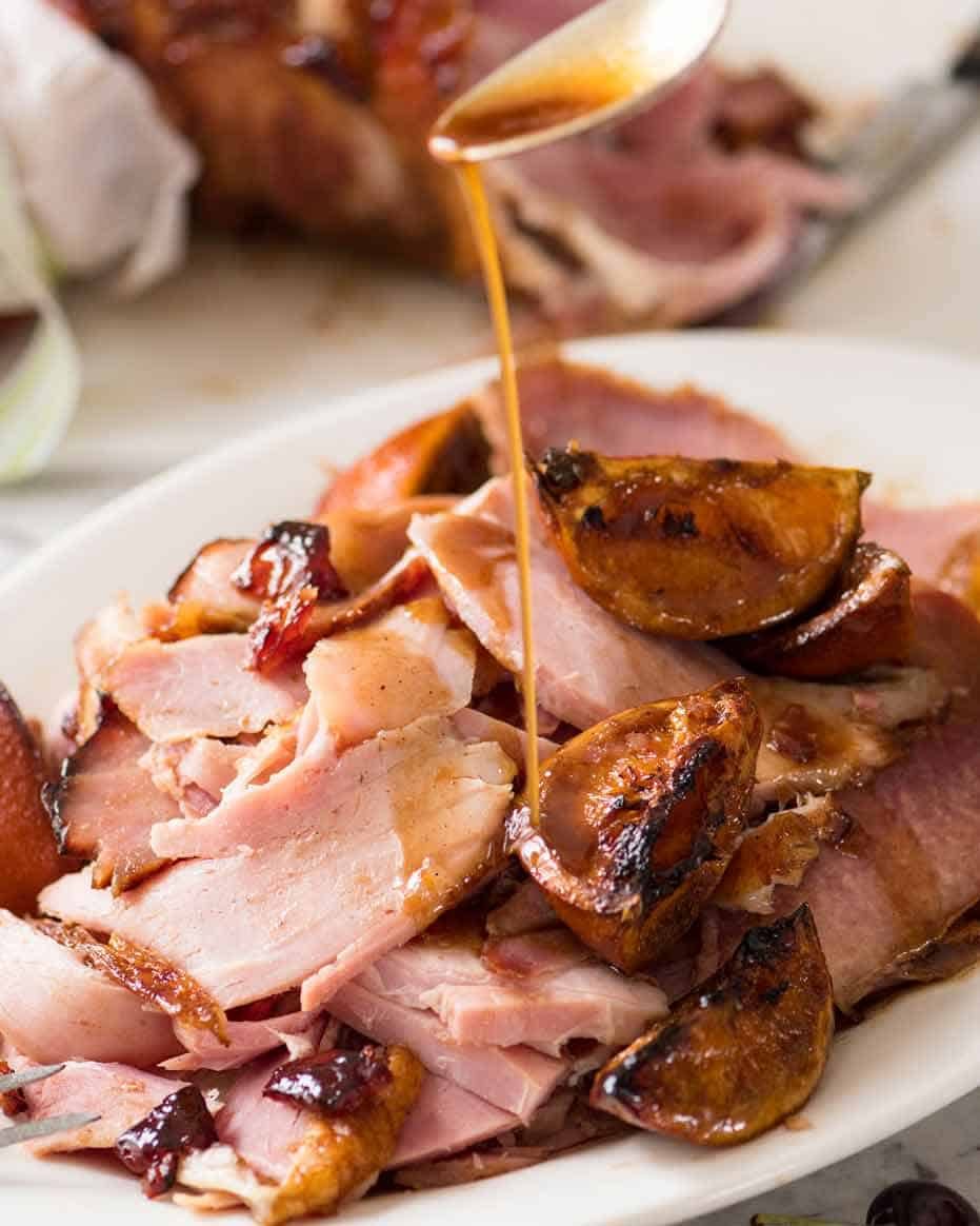 drizzling-sauce-over-maple-glazed-ham-1 Drizzling sauce over Maple Glazed Ham